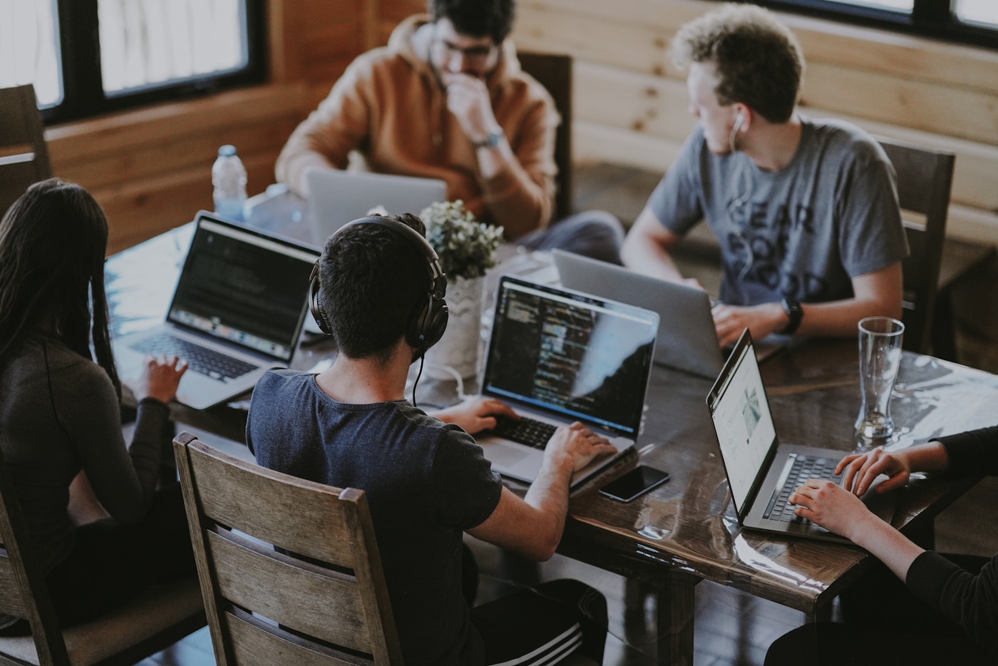 Team collaborating at computers